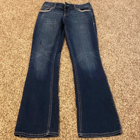 Only worn once medium wash jeans - Picture 1 of 3
